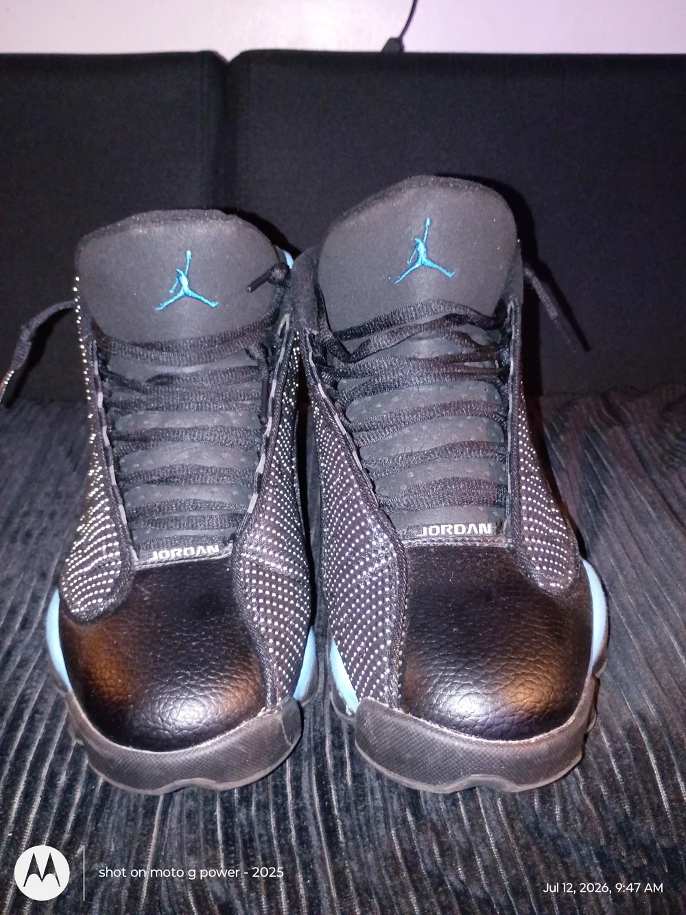 Jordan 13s Black Sneakers with Teal Jumpman Accents